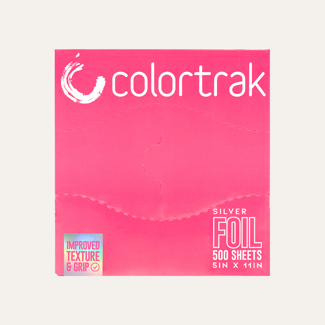 A square pink package of Colortrak silver foil sheets, 500 count, 5in x 11in. The package features a white logo at the top and a small badge in the bottom left corner that reads 'IMPROVED TEXTURE & GRIP'.