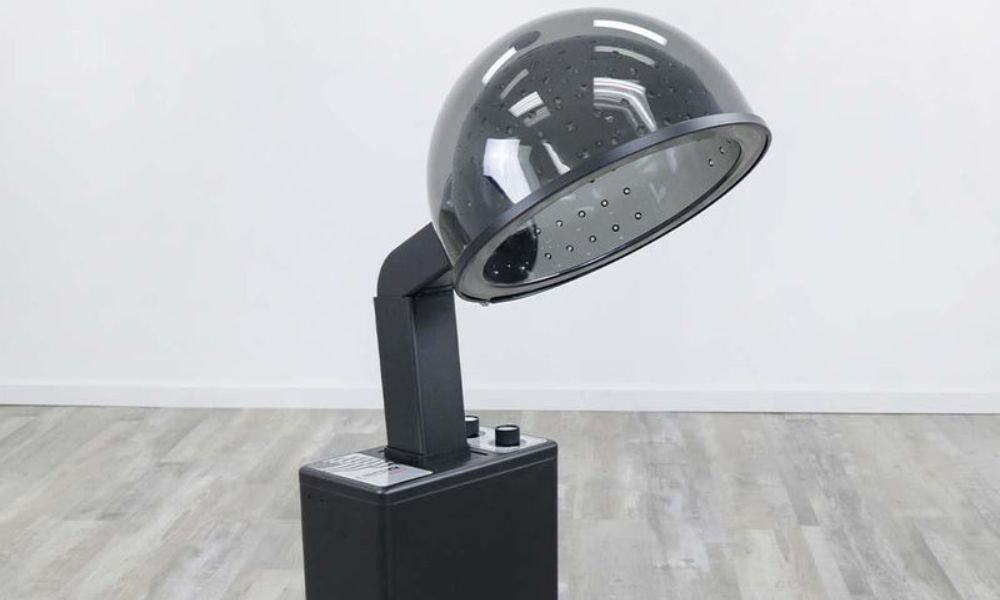Black professional hooded salon hair dryer on stand