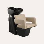 Beige salon chair with black basin on a white background