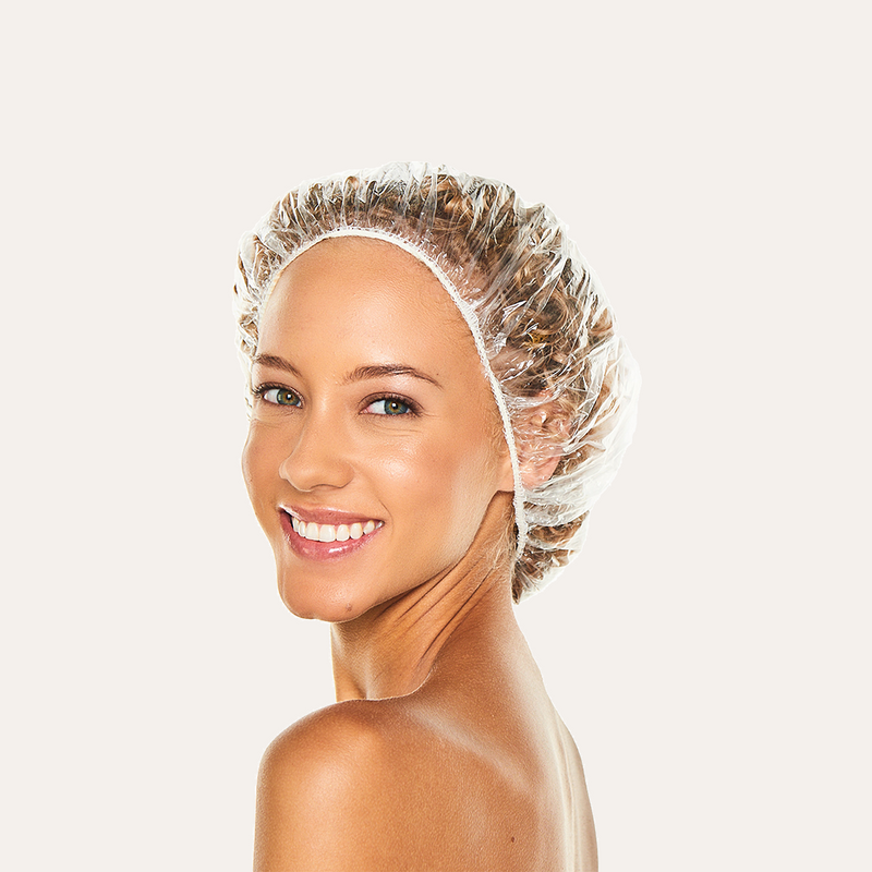 Clear bouffant processing cap with width and height measurements