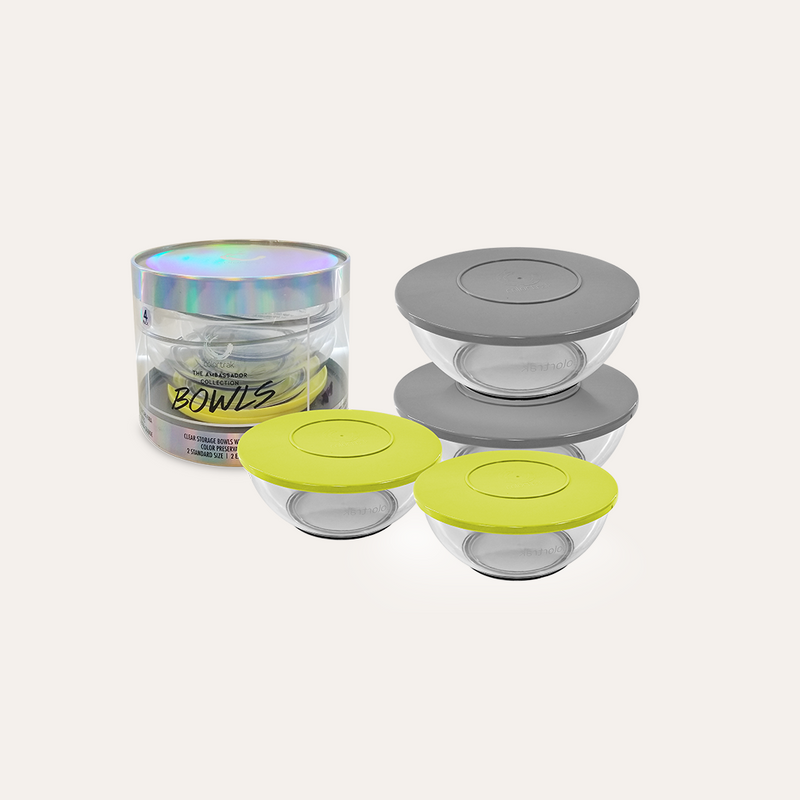 Nested clear Ambassador bowls and lids arranged on a pale blue background