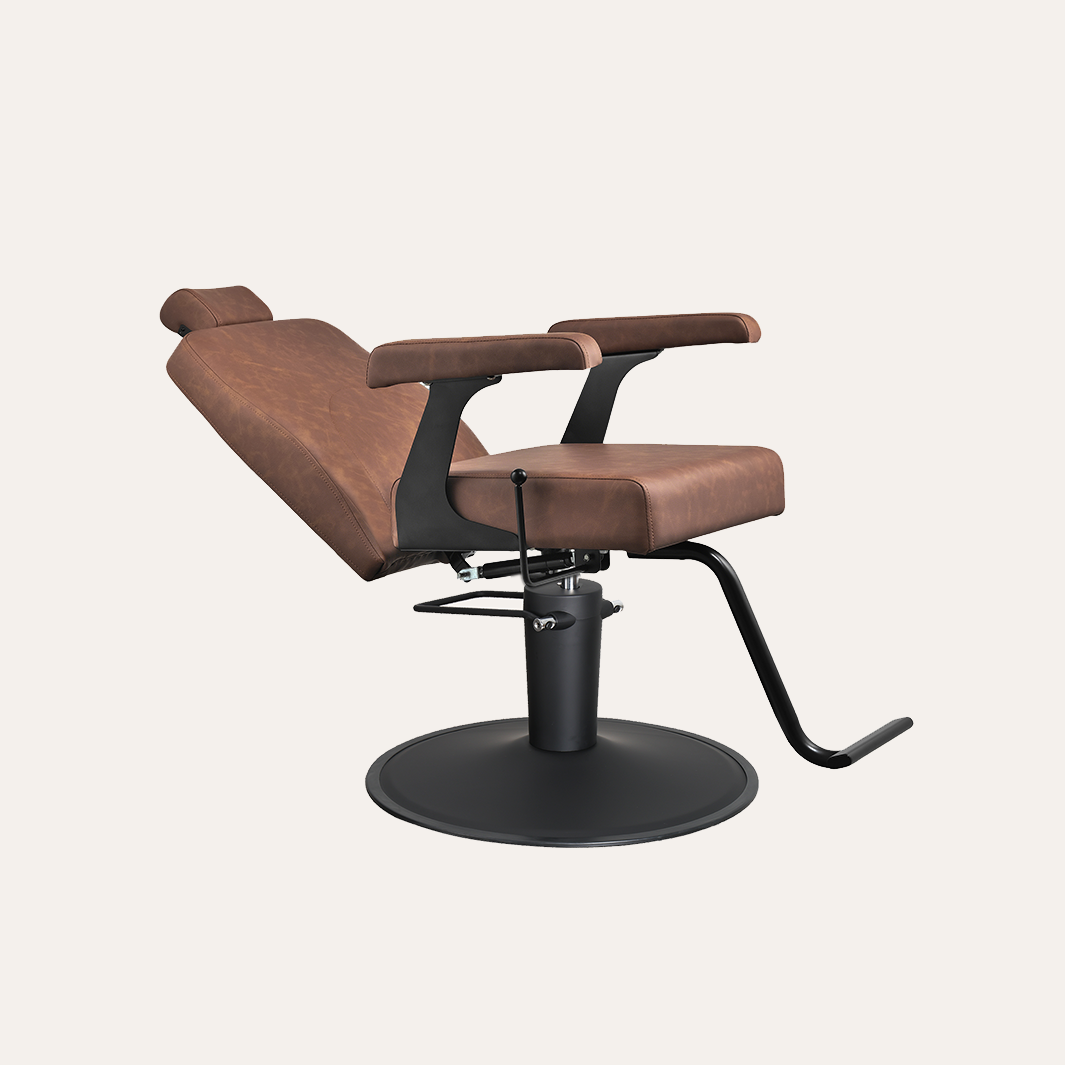 Brown reclining all purpose chair with black base on a white background