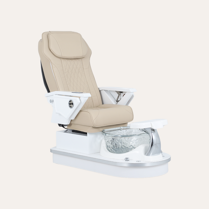 A luxury pedicure spa chair with a beige quilted leather seat and white base, featuring an integrated foot basin with a clear textured liner.