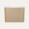 Beige ribbed surface with white top on a light beige background