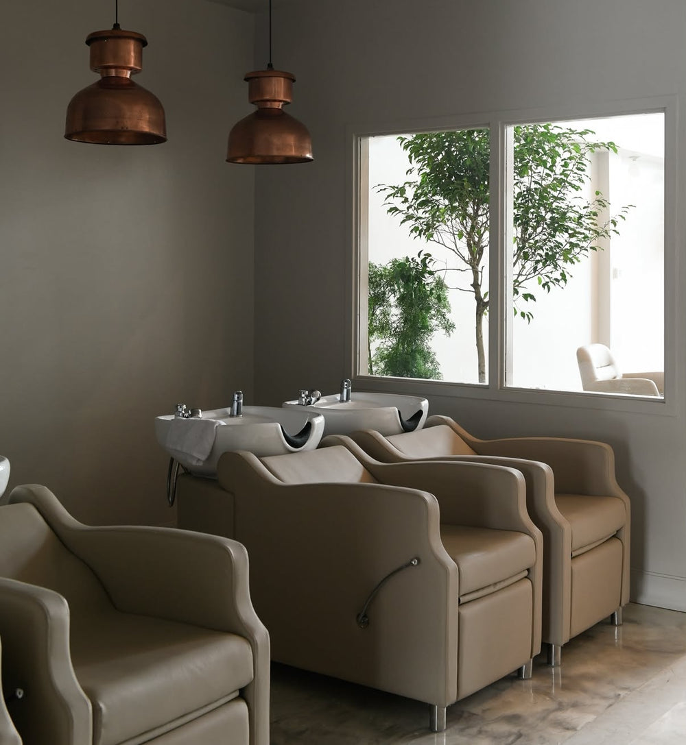 Bright spa space with a cream treatment chair